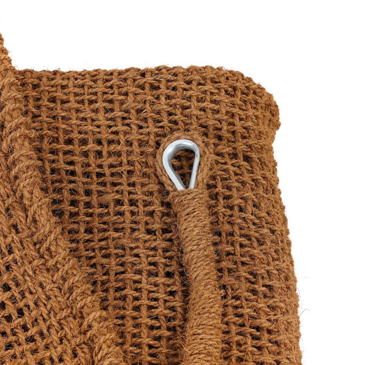 Close-up of handwoven natural coco shade fabric with metal ring, perfect for creating a Bohemian vibe in outdoor spaces.