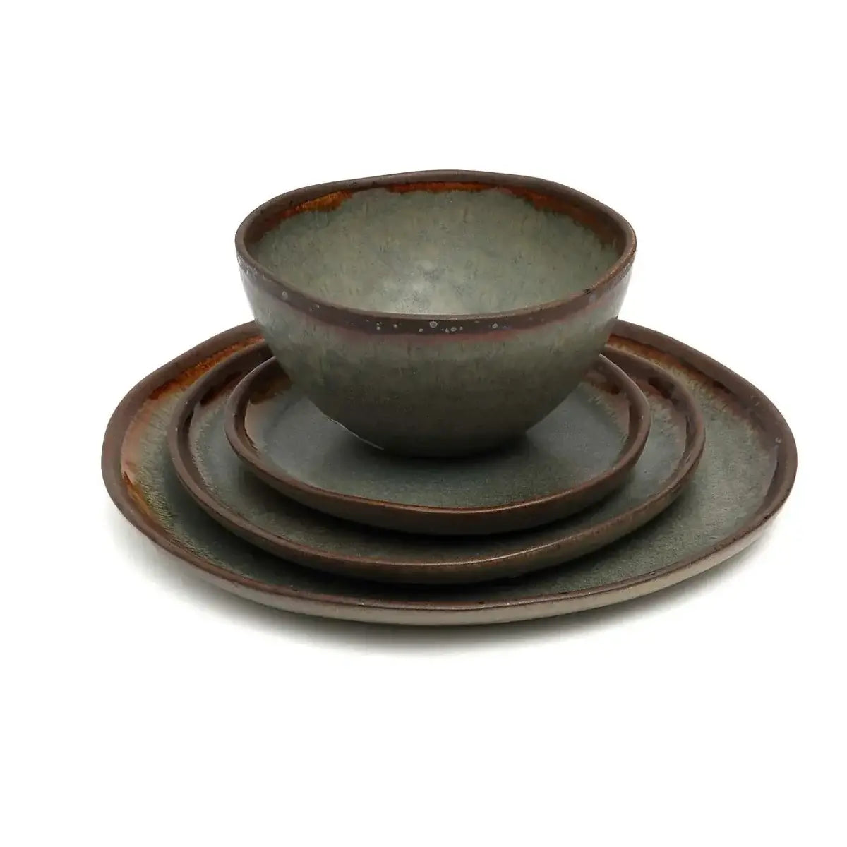 Handmade Portuguese ceramic bowl and plate set from De Côa collection, featuring natural color nuances and a bohemian style.