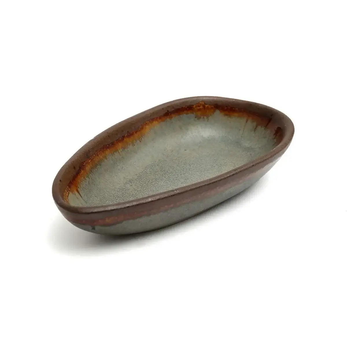 Handmade Portuguese ceramic serving bowl, small size, showcasing unique craftsmanship with subtle color nuances.