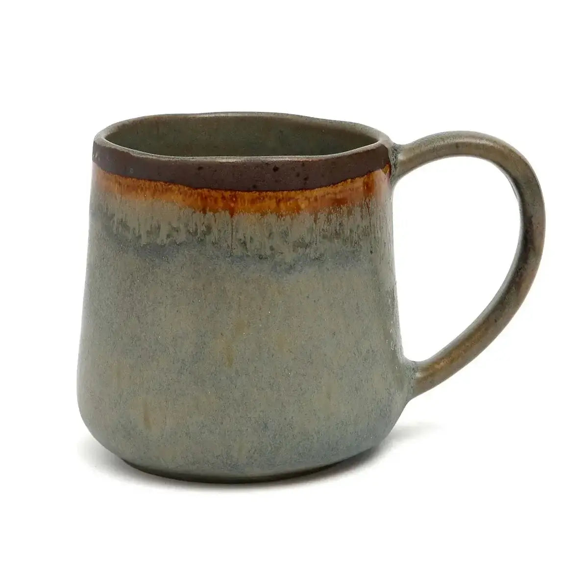 Handmade Portuguese ceramic mug from De Côa-mok set, showcasing natural hues and elegant design for stylish coffee moments.