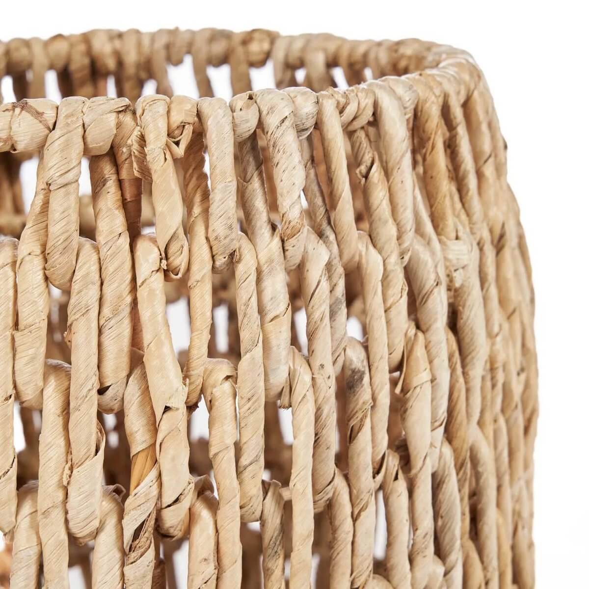 Close-up of the De Louh Louh Mand, a handwoven banana leaf basket showcasing its bohemian style and natural charm.