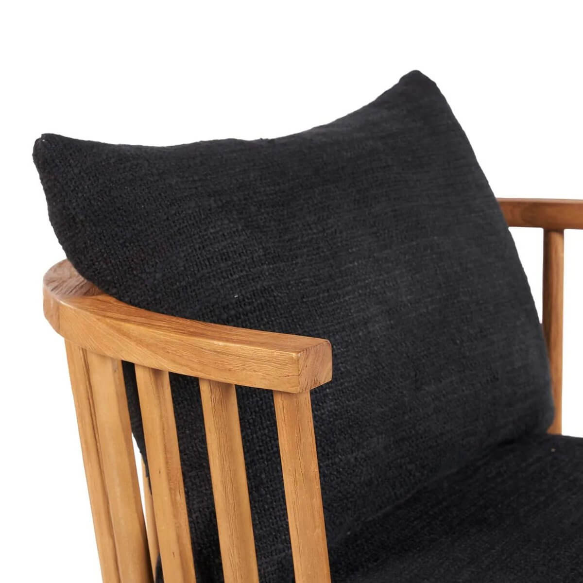 Bohemian style chair with black cushions and teak frame, perfect for adding elegance to indoor or covered outdoor spaces.