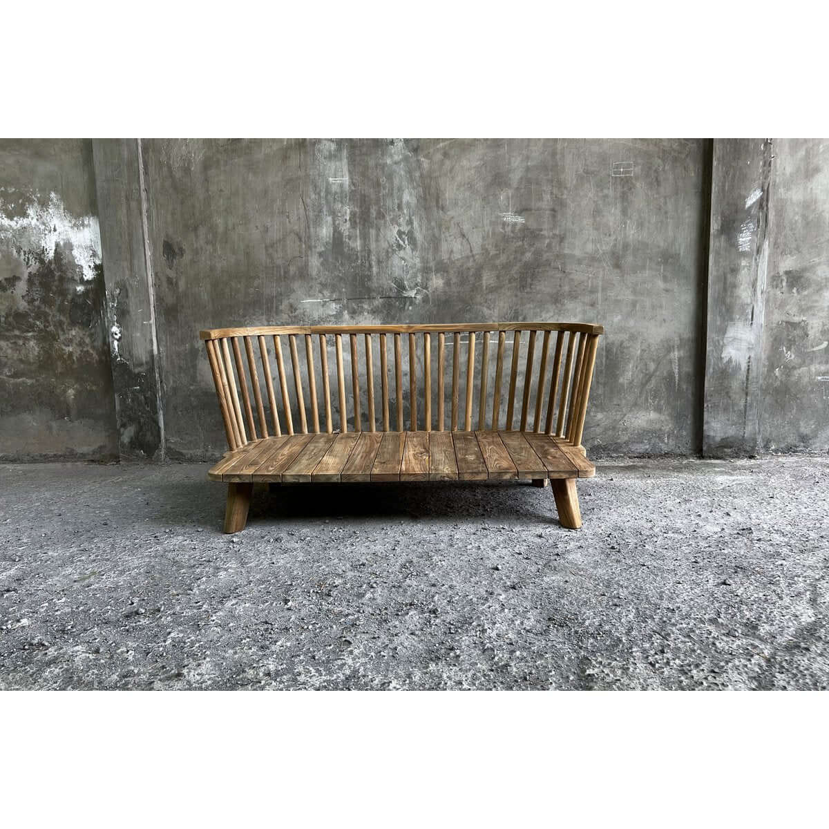 Bohemian De Malawi One Seater with natural tierra teak in industrial setting, featuring plush cushioning and unique design.