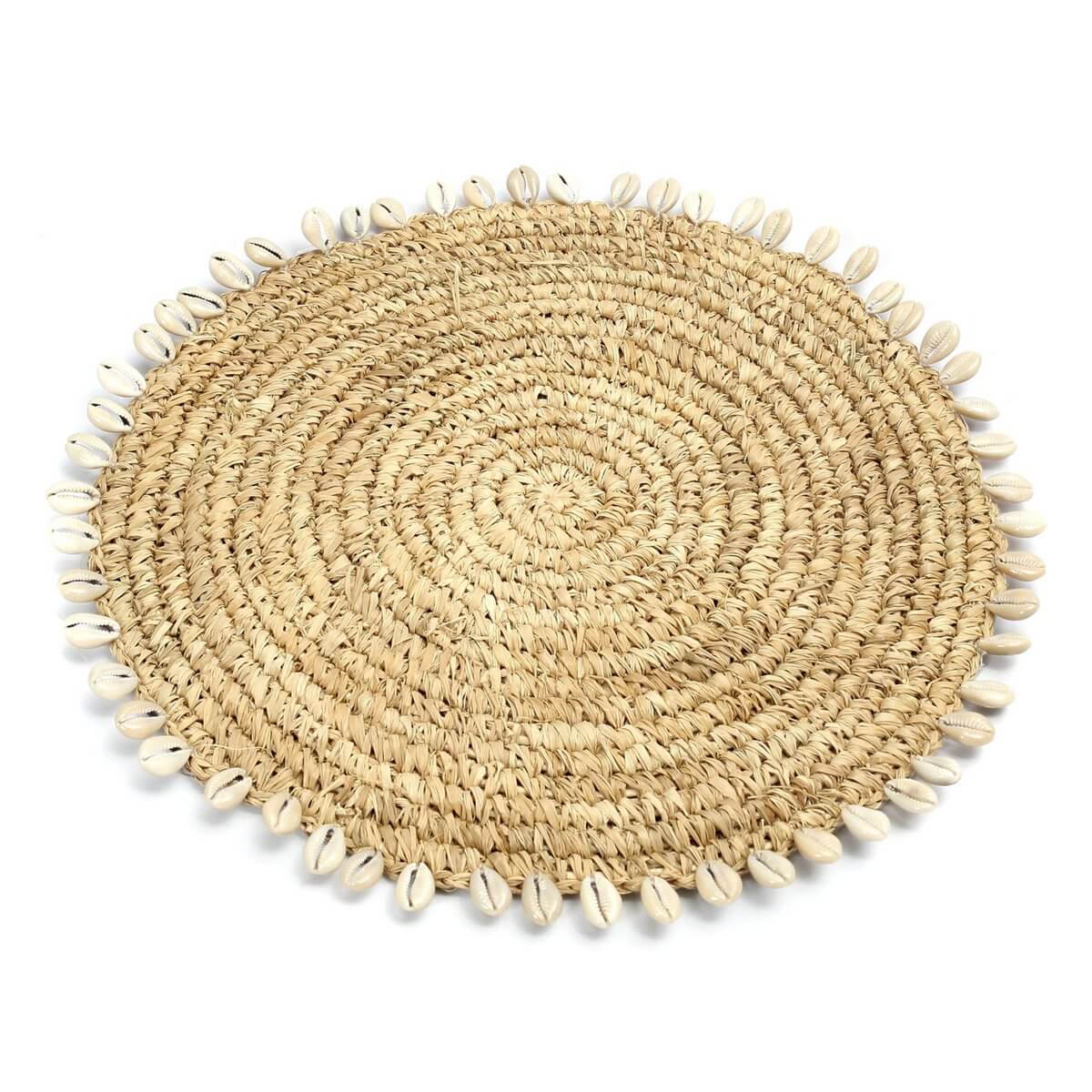 Bohemian raffia pan coaster with kauri shells, 23cm round, by Bazar Bizar Living, island-style elegance for any table setting.