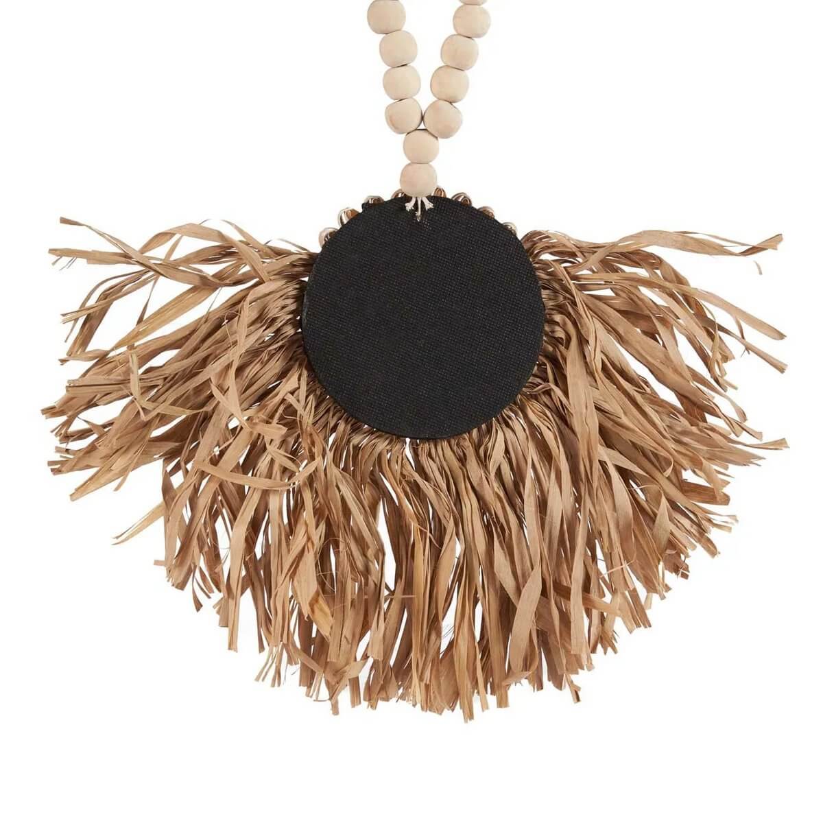 Bohemian style Raffia Tajoe kwastje made from natural fibers, perfect for rustic decor accents in homes.