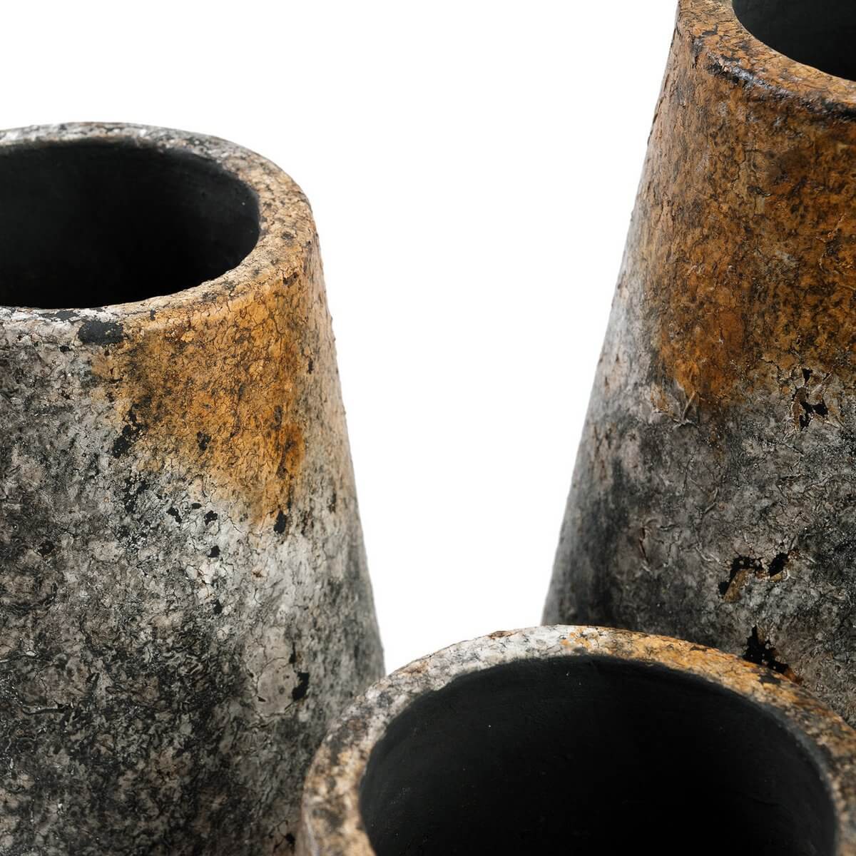 Close-up of three rustic Spooky vases made from terracotta with an antique gray and bohemian design, perfect for flowers.