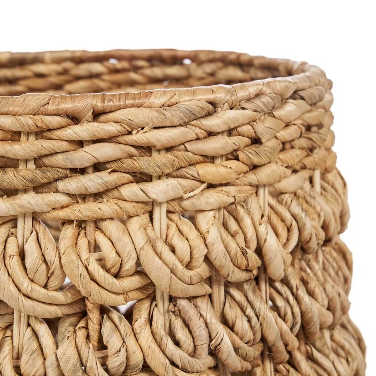 Close-up of handmade De Tarajih Basket crafted from banana leaf with bohemian charm and natural texture.