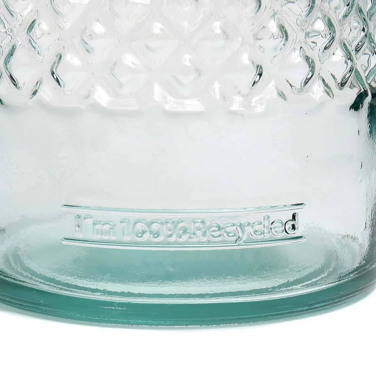 Close-up of a light turquoise, Bohemian-style bottle with embossed diamond pattern and 'I'm 100% Recycled' text.