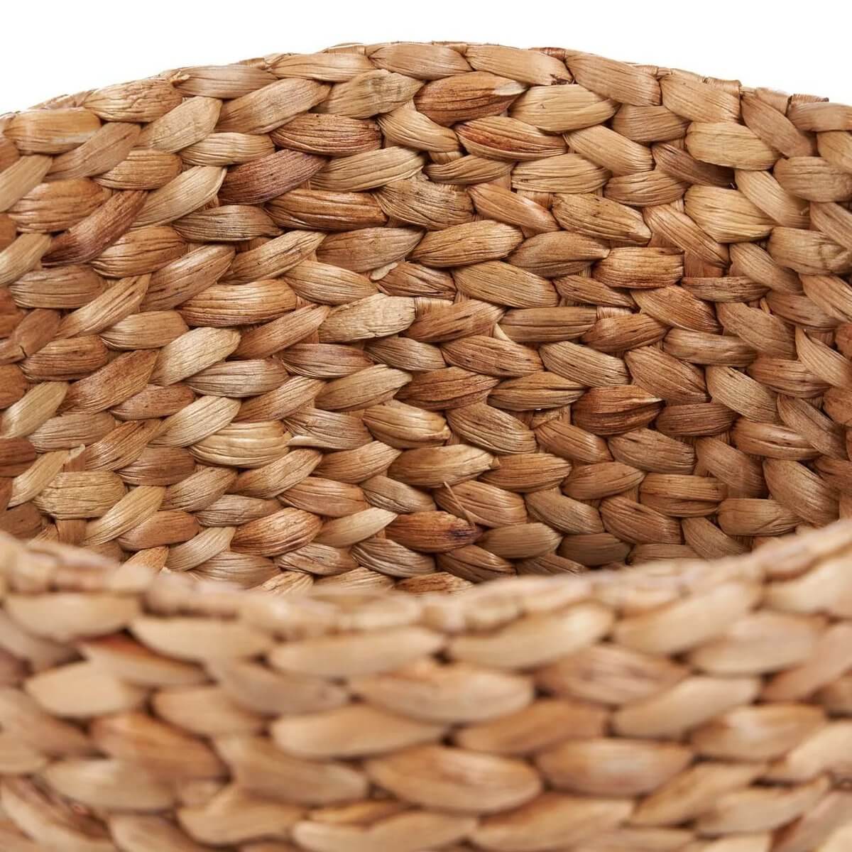 Close-up of Bohemian style Bumaga Basket made from water hyacinth, showcasing its natural woven texture and rustic charm.
