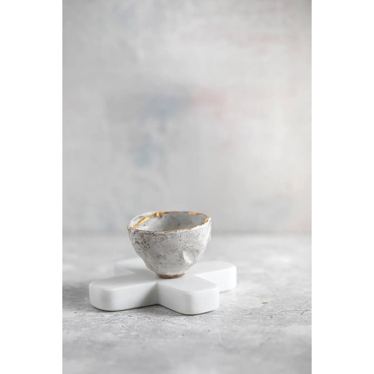Marble pot coaster with bohemian flair, 12cm wide, adds elegance to dining settings. Perfect for stylish homes. Bazar Bizar Living.