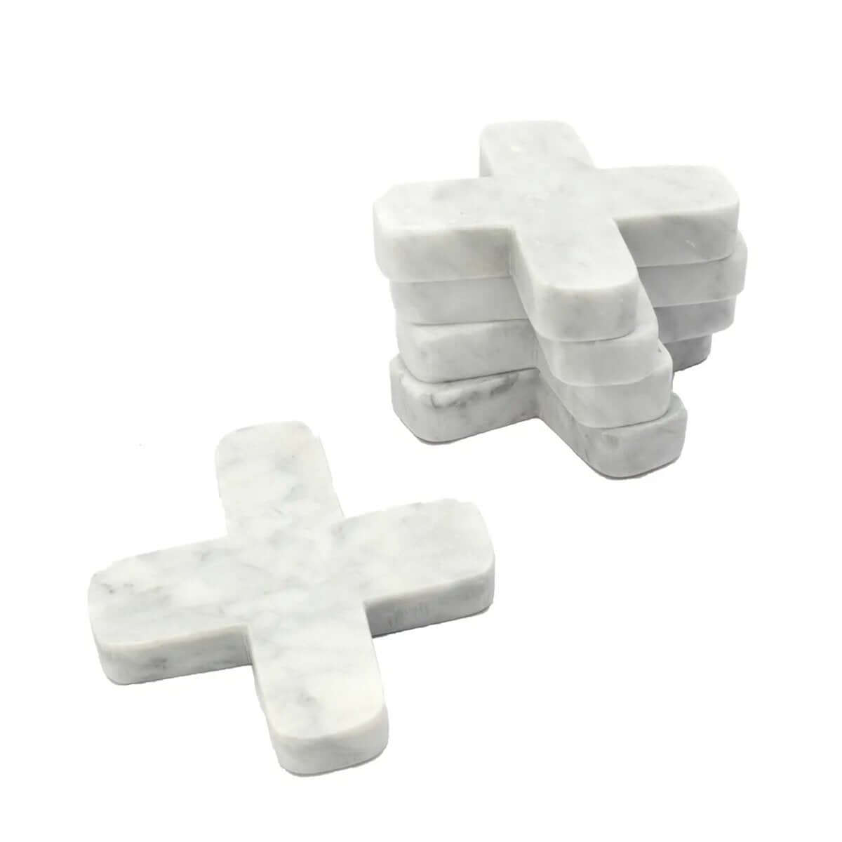 Elegant marble pot coasters in a cross shape, perfect for a Bohemian table setting. Adds a chic touch to any interior with Bazar Bizar charm.