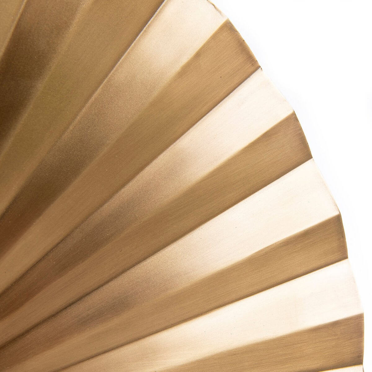 Close-up of the De Tsijn bohemian wall lamp in brass, showcasing its elegant handcrafted metal fan design by Bazar Bizar Living.