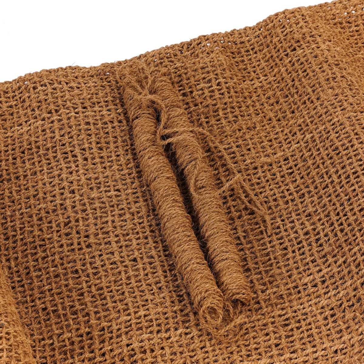 Close-up of a natural bohemian Coco Fence made from rustic coconut fibers, perfect for adding style and privacy to any outdoor space.