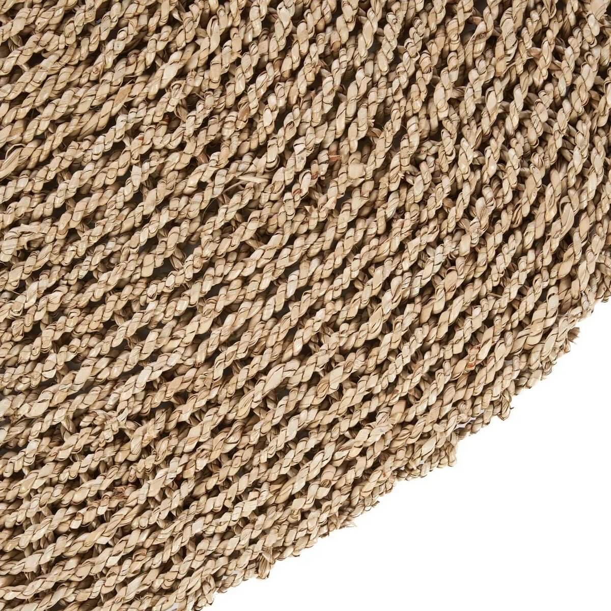 Close-up of Het I'm Tapijt naturel sisal rug showing intricate woven texture, perfect for a Bohemian style home.