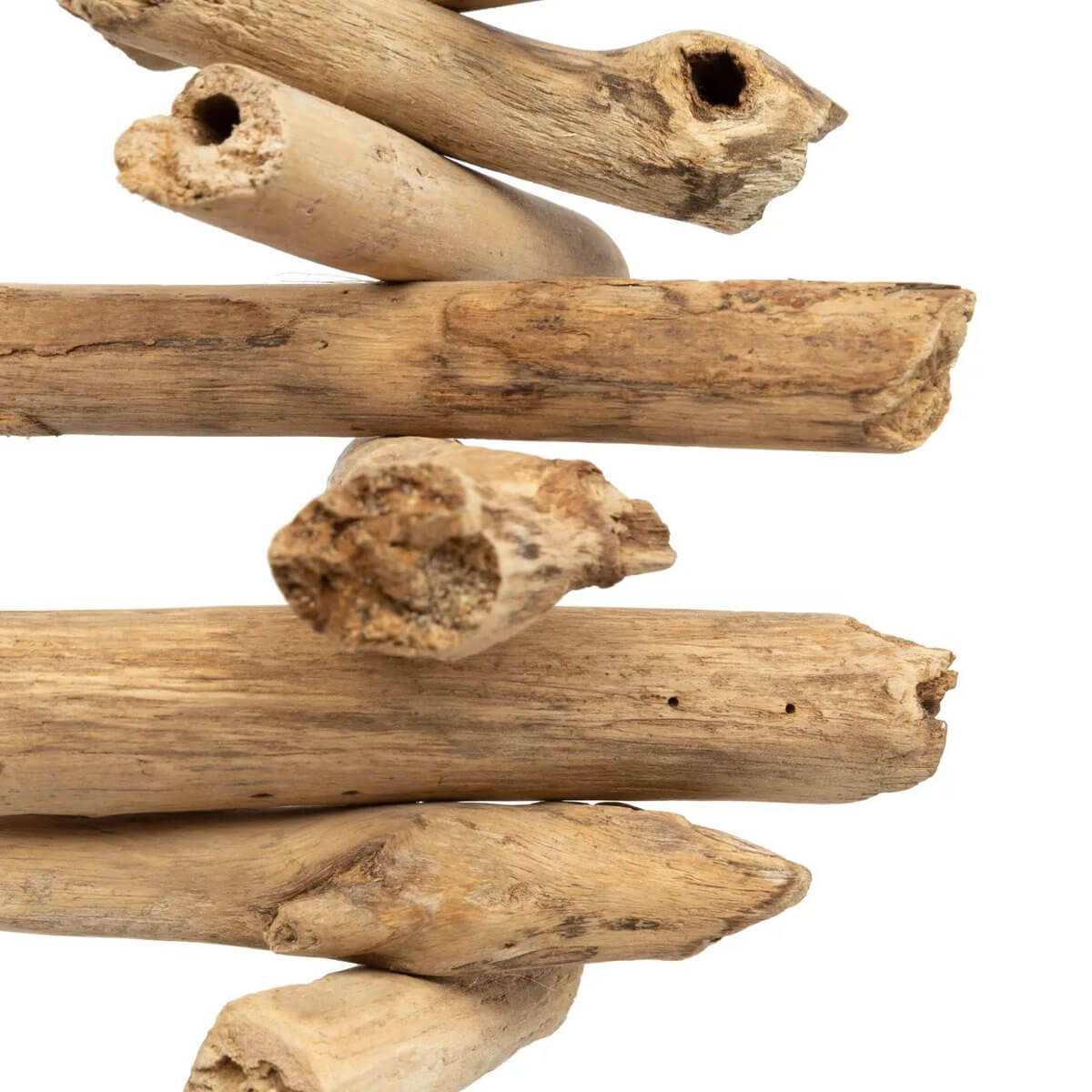 Close-up of natural driftwood sticks, showcasing their rustic texture and unique shapes.