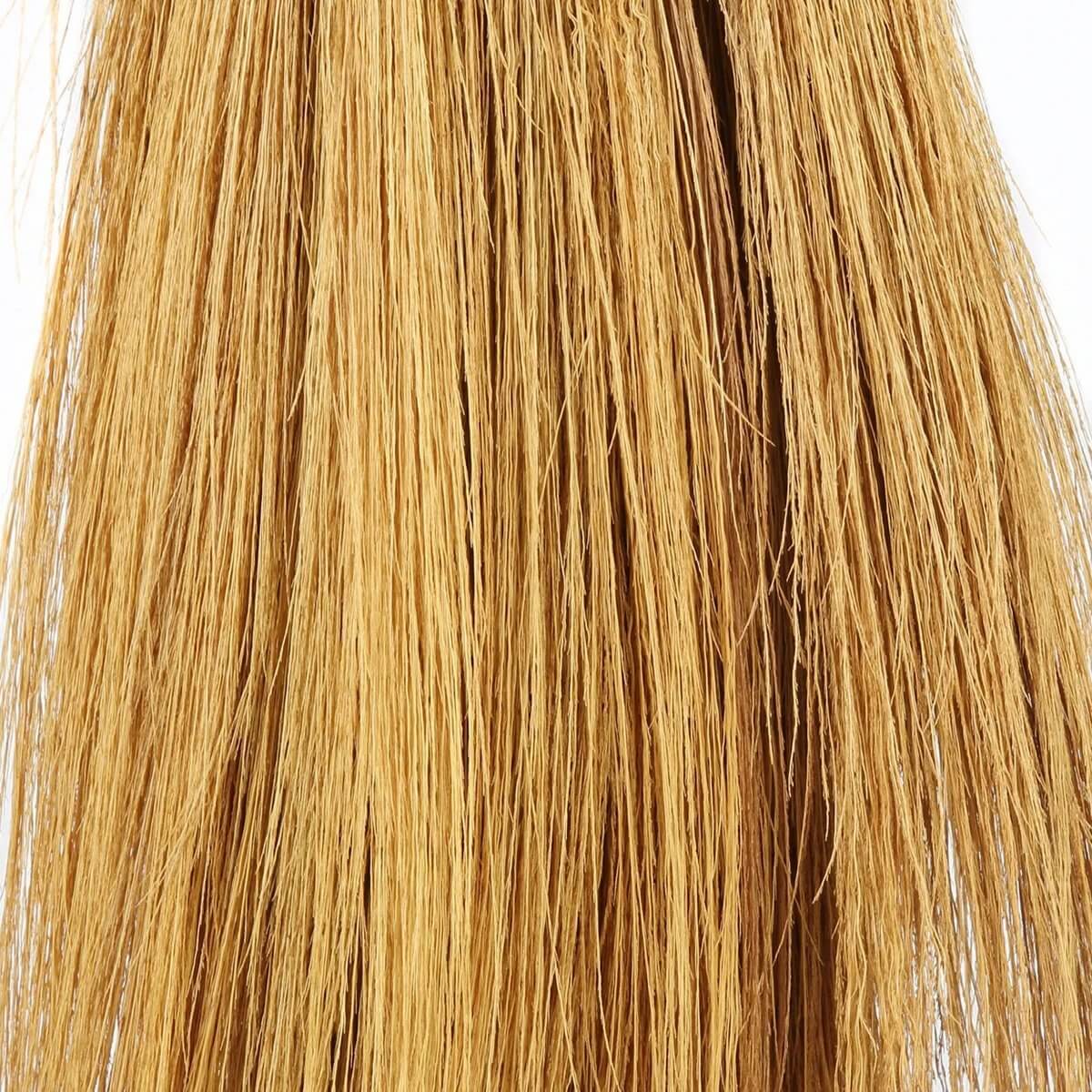 Close-up van Rayung gras vezels in natuurlijke tinten, ideaal voor bohemian interieurdecoratie.