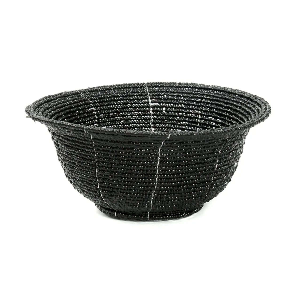 Delicate handwoven black beaded bowl for bohemian decor, perfect for enhancing any room's aesthetic with chic and functional storage.