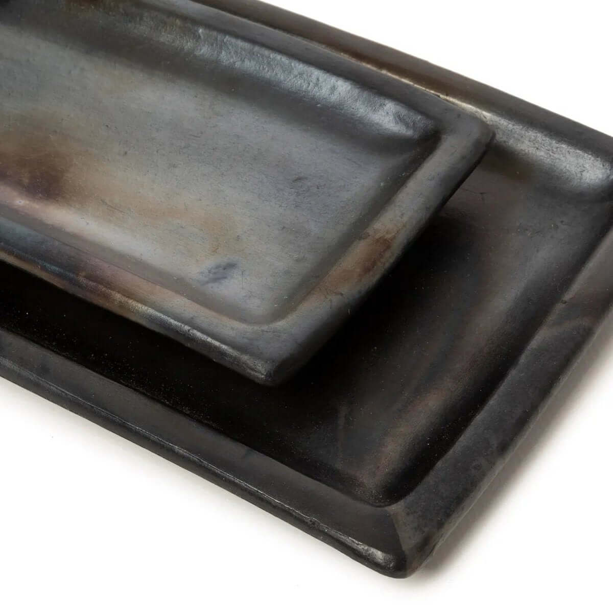 Burned sushi board in black terracotta, bohemian style by Bazar Bizar Living, elegant design ideal for serving sushi.