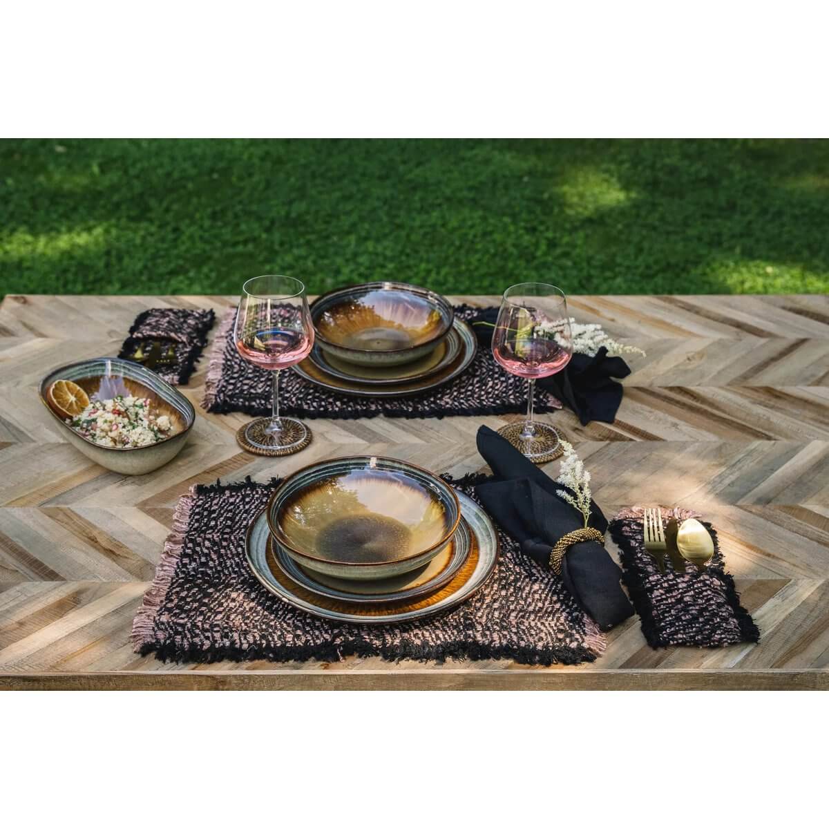 Bohemian themed table setting with black copper cutlery holders, luxurious cotton with silk look, perfect for any elegant dinner.