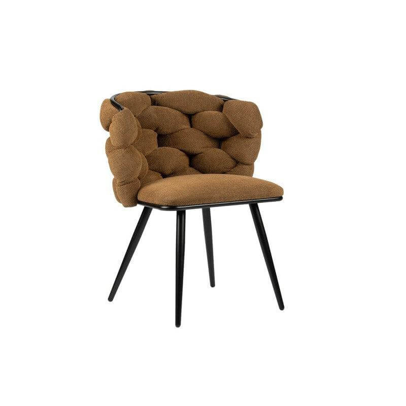 De Rock Chair in terrakleur, een opvallende stoel met uniek weefpatroon in de rugleuning, perfecte eyecatcher en gespreksstarter.