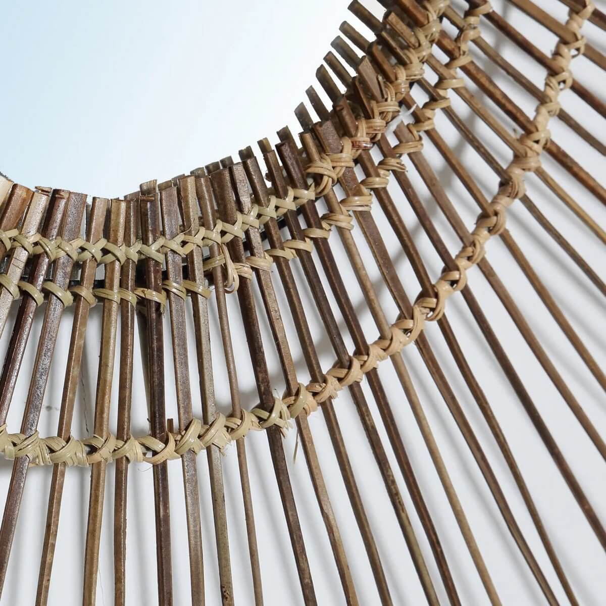 Close-up of Bohemian Tropical Mirror made of rattan, showcasing a woven rustic design perfect for natural elegance and island-inspired charm.