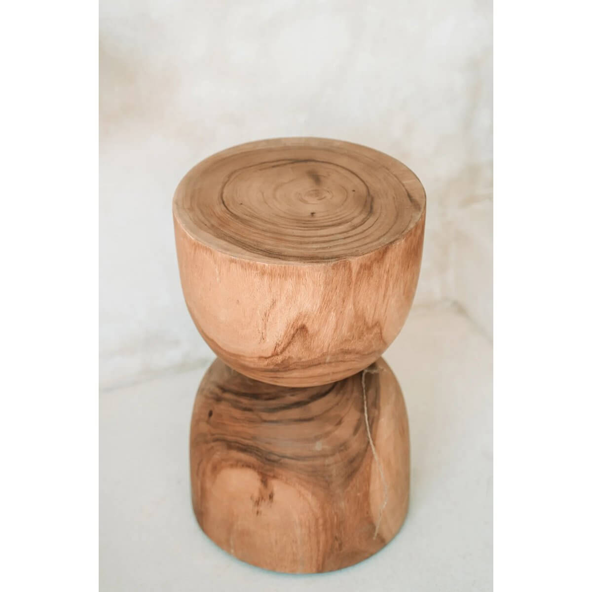 Bohemian style Azure kruk made of natural suar wood with unique grain, versatile as a stool or side table.