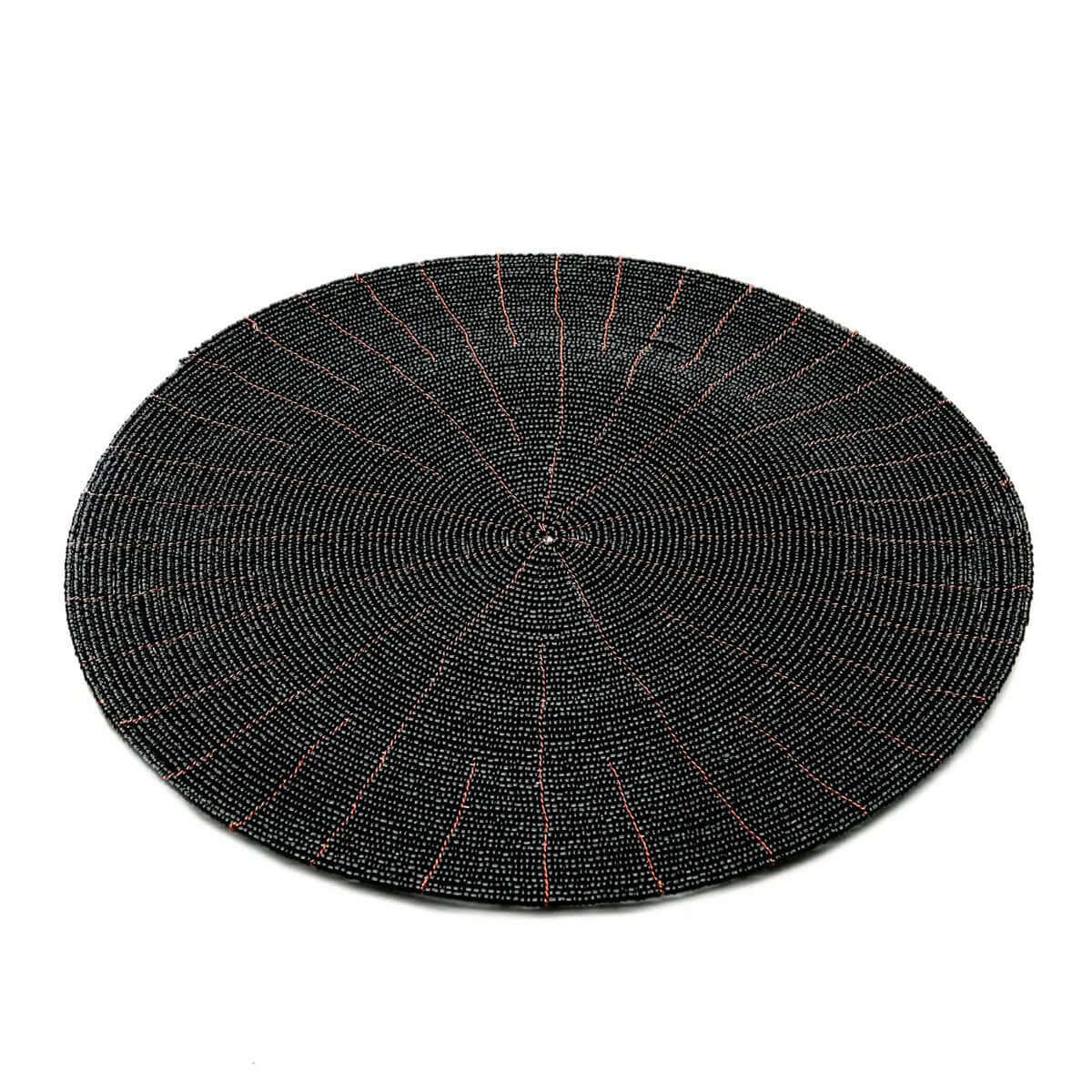 Bohemian chic De Beaded Placemat in zwart, perfect for a stylish Boho table setting, handmade with beads, 30cm diameter, by Bazar Bizar Living.
