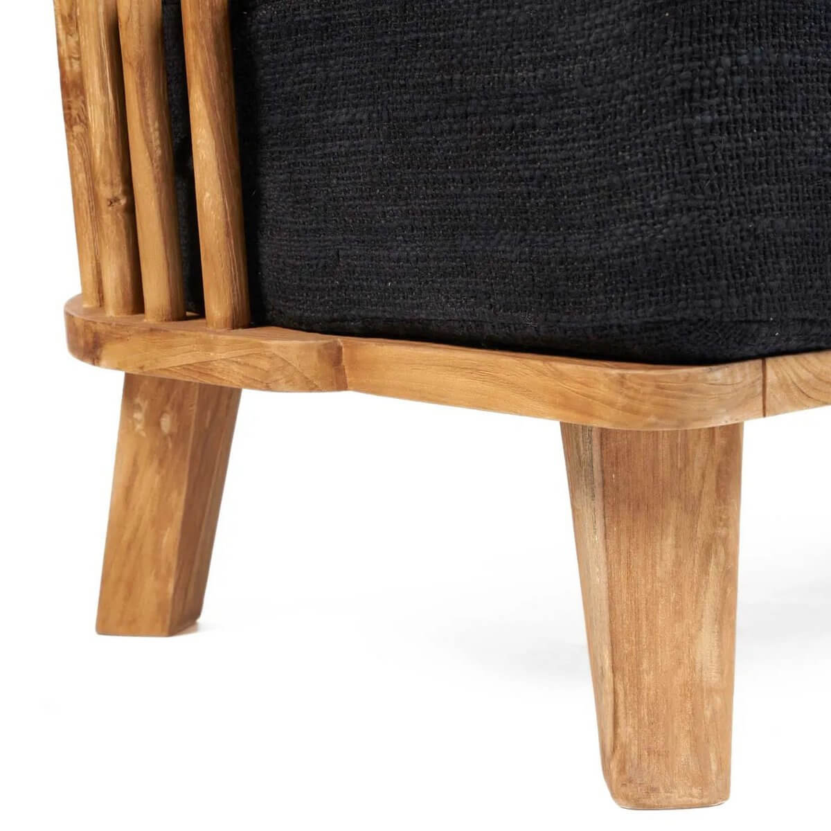 Close-up of De Malawi twee-zitter, featuring black fabric and recycled teak wood legs; perfect for a Bohemian aesthetic.