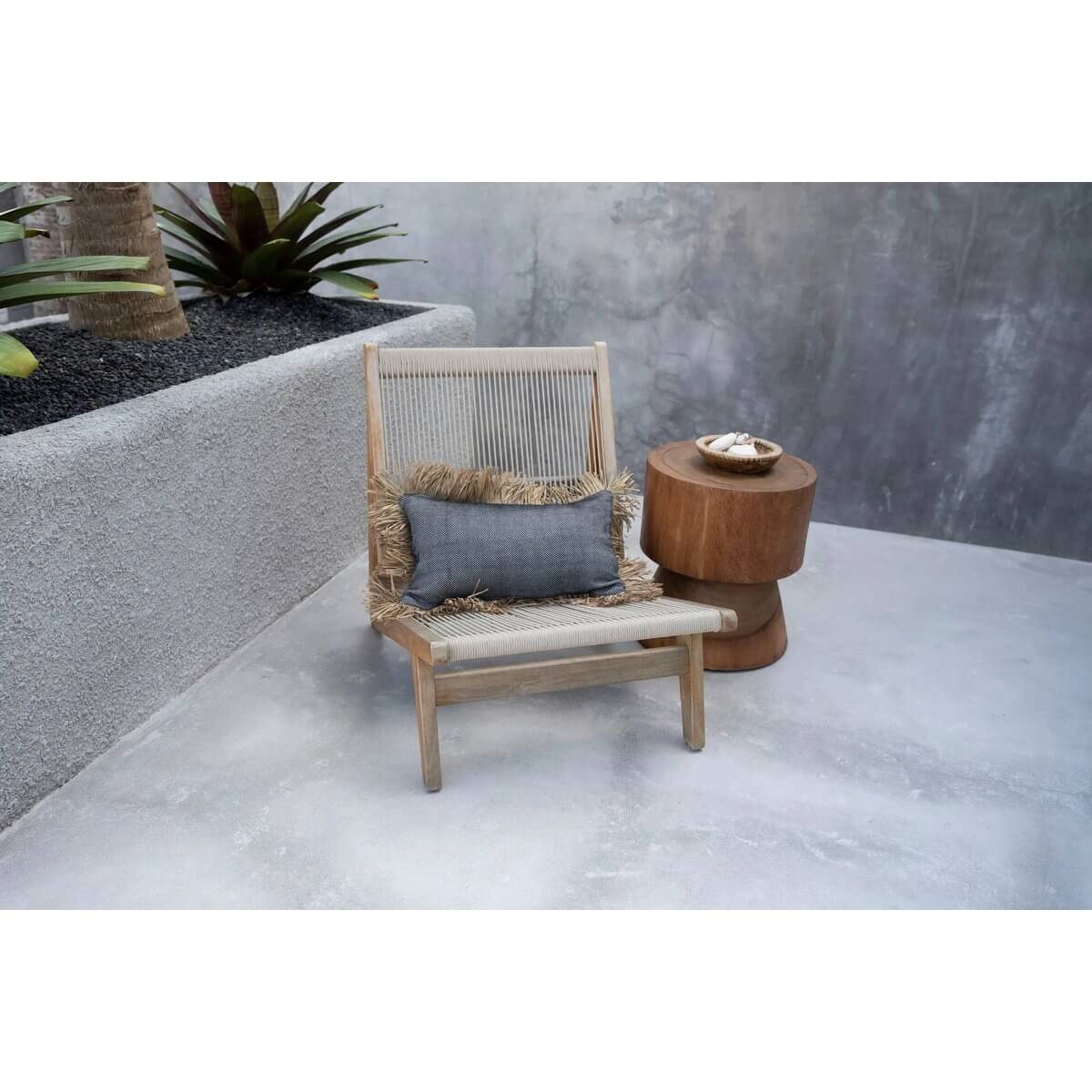 Bohemian design with De Mitcha Kruk, a minimalist stool or side table showcasing natural wood for modern living spaces.