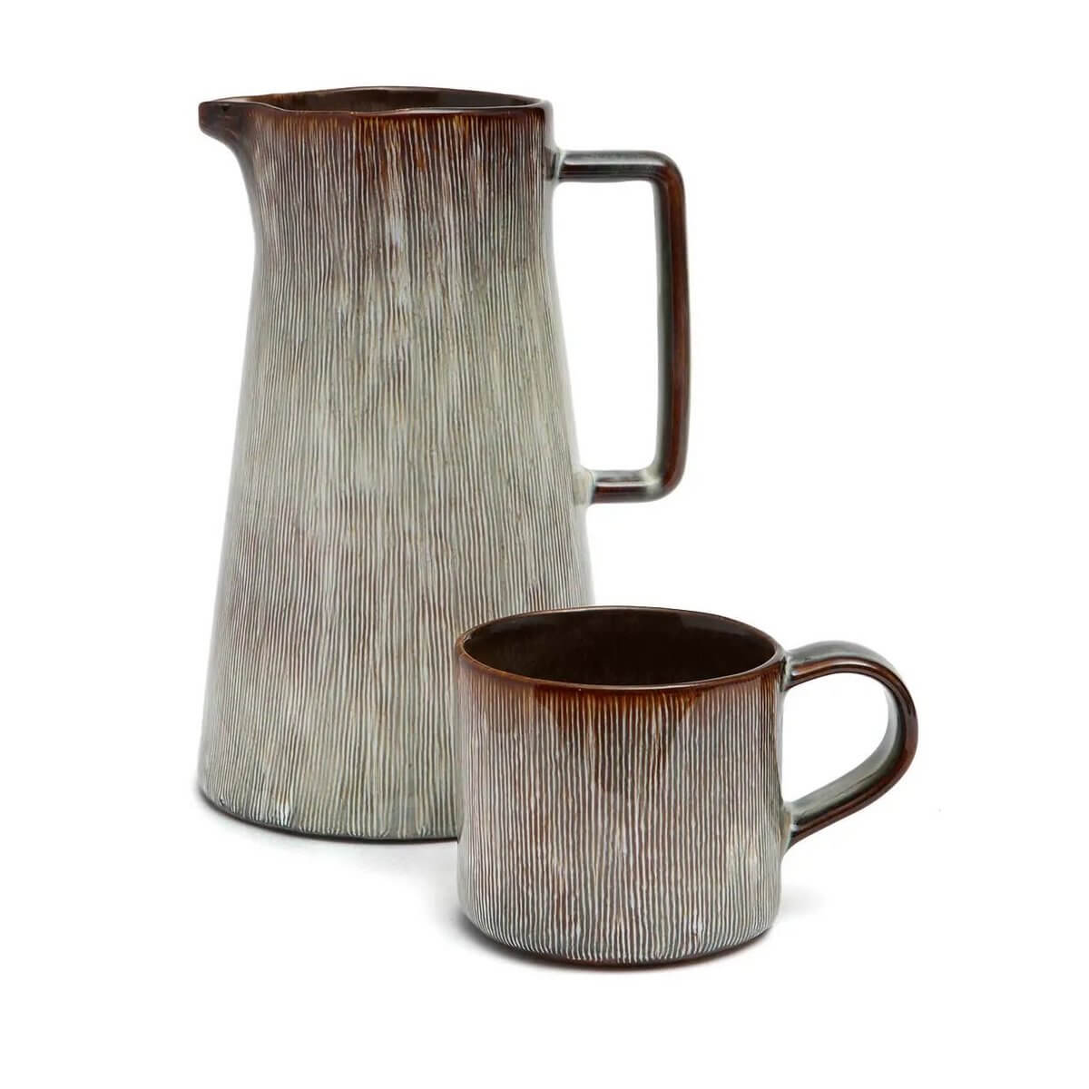 Elegant Peniche pitcher and cup set, perfect for adding coastal charm to your table, with a beach-inspired design.