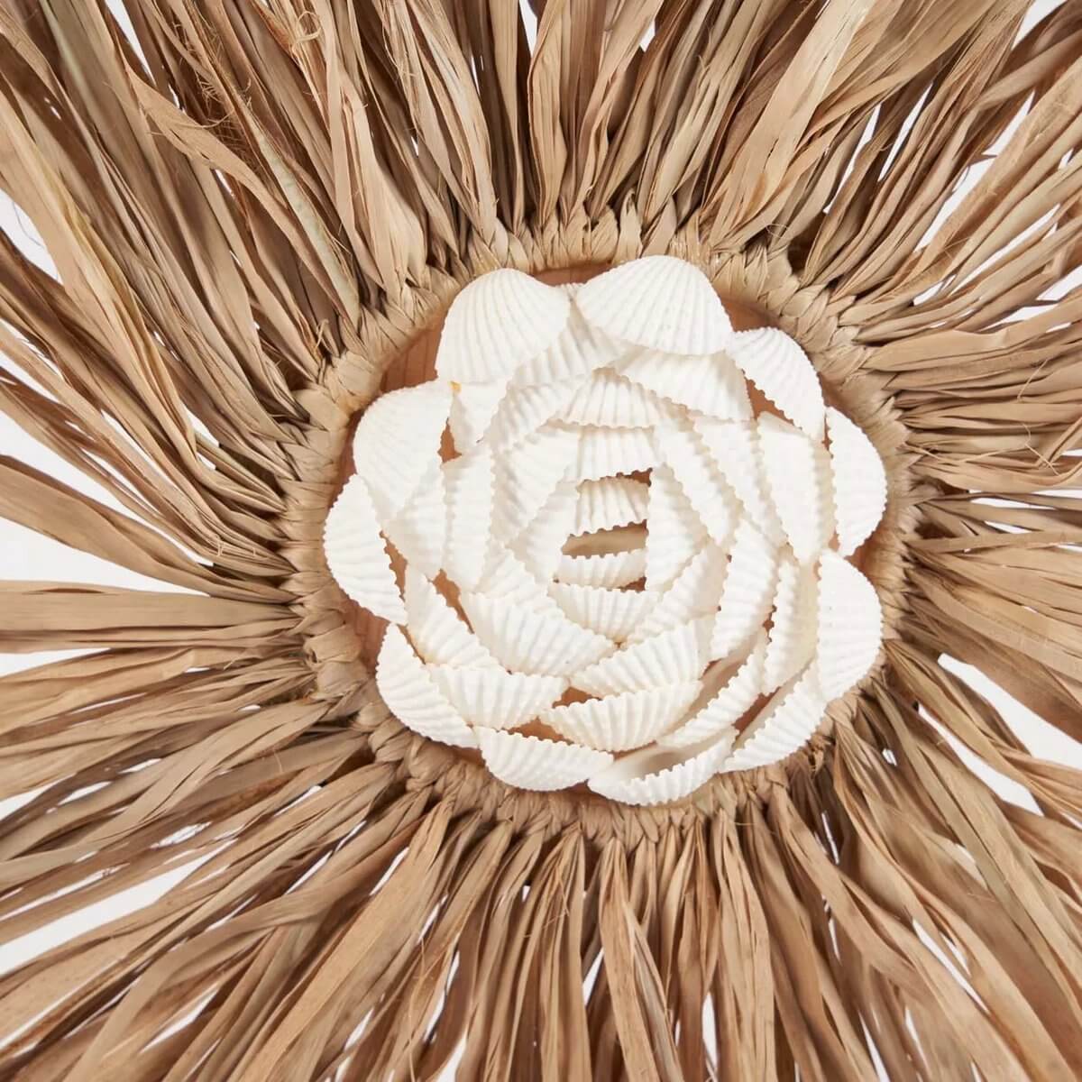 Bohemian decor with intricate raffia flower design, showcasing natural textures and a rustic charm. Perfect for a unique, elegant touch.