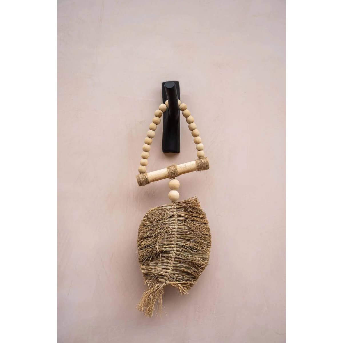 Bohemian raffia tassel by Balinese artisans, perfect for doors or walls, enhances exotic home decor. Size: 60x25cm. Brand: Bazar Bizar Living.