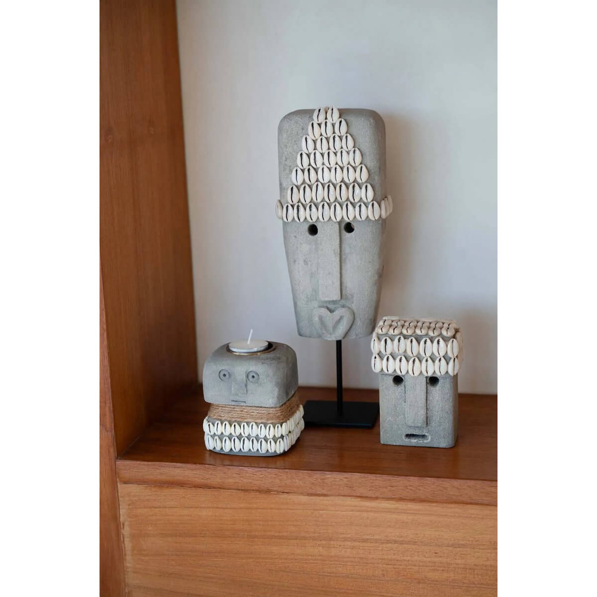 Hand-carved Sumba-stone statues from Indonesia, perfect for a Bohemian decor with their protective and healing symbolism.