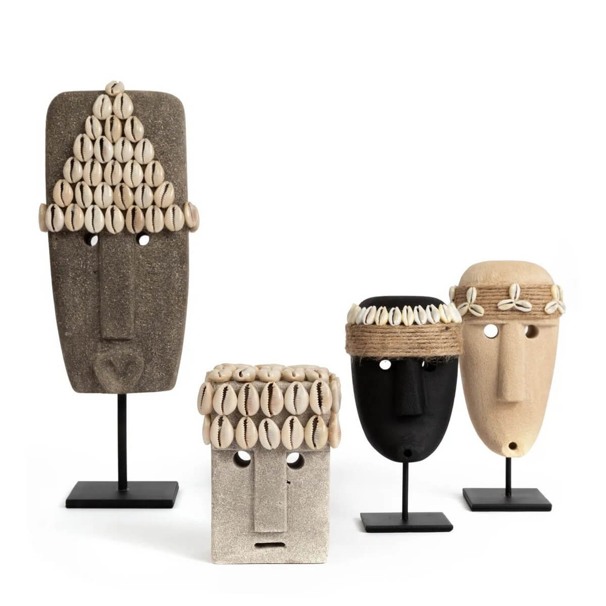 Bohemian Sumba stone sculptures with shell embellishments, handcrafted in Indonesia. Perfect for home decor and protection.