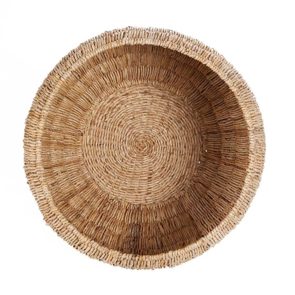 Bohemian style Tatum basket made of banana leaf with round shape, perfect for storage or decoration, adding natural warmth.