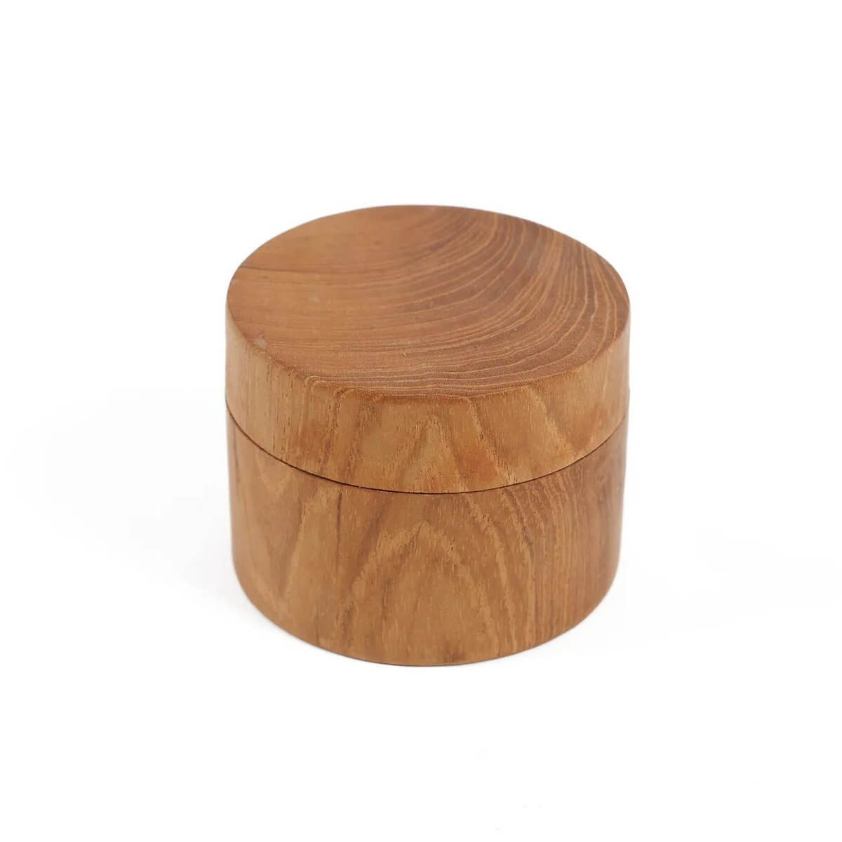 Hand-carved teak root jar with intricate textures, perfect for bohemian home decor and versatile storage solutions.