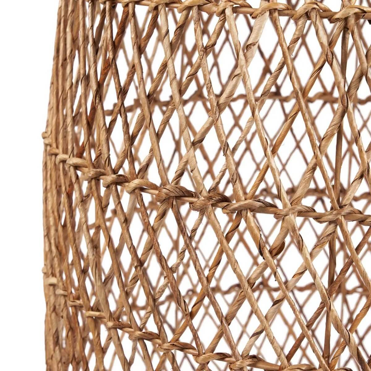 Close-up of bohemian Xiomara hanger in natural banana leaf texture, showcasing intricate weaving and organic charm, perfect for cozy decor.