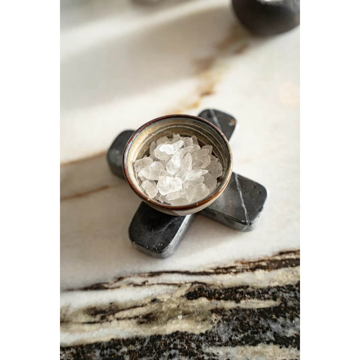 Alt Tag: Stylish black marble pot holder from Bazar Bizar Living, adds a chic Bohemian touch, perfect for a 12cm wide table setting.
