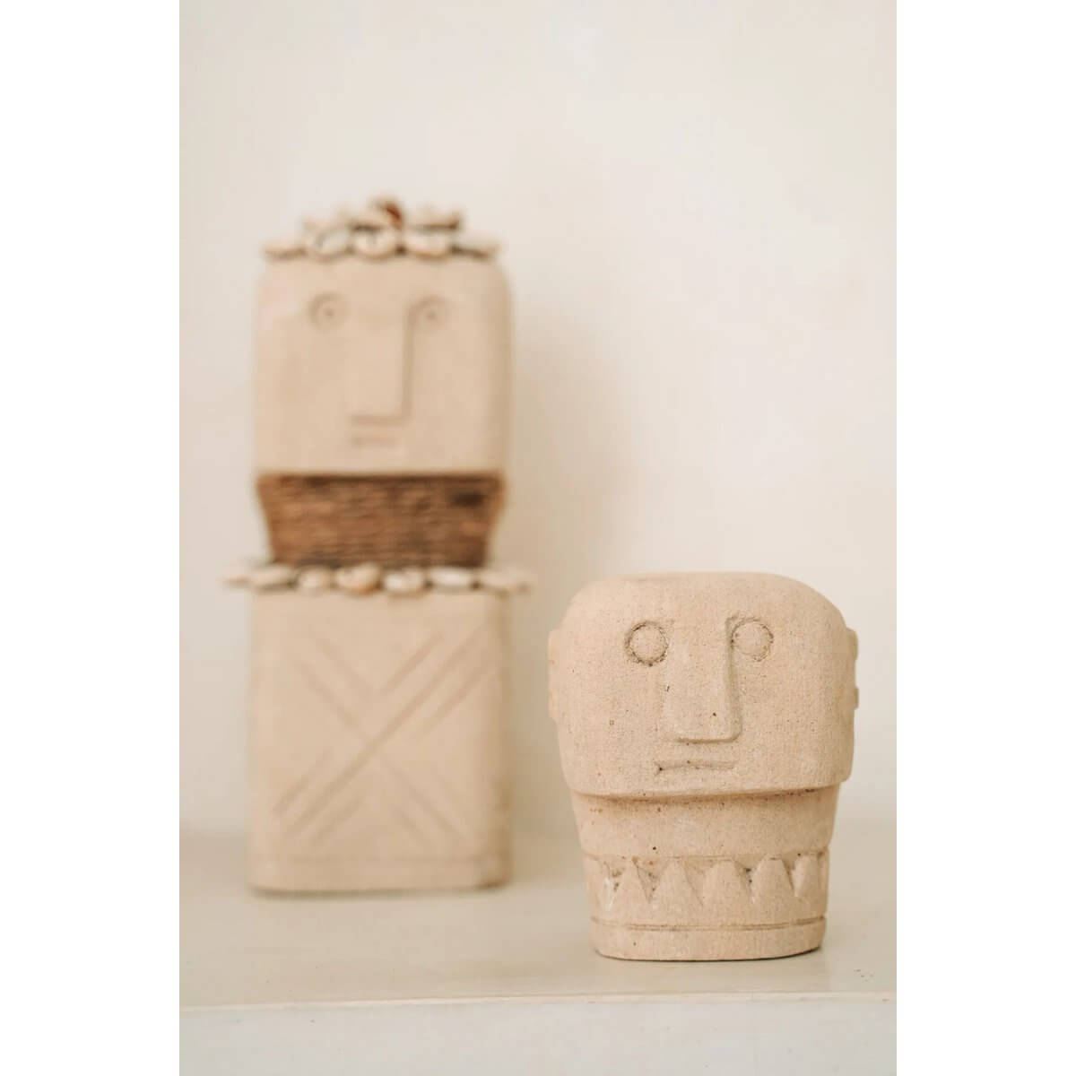 Bohemian stone statues from Sumba Island, hand-carved from sandstone, showcasing traditional craftsmanship and cultural heritage.