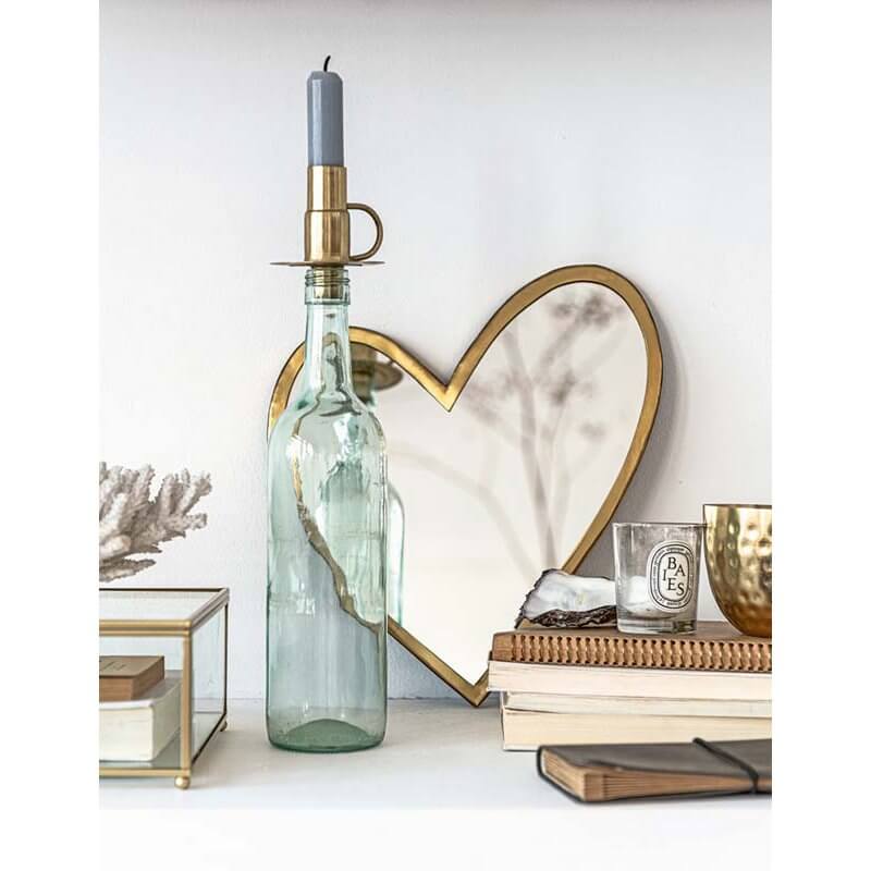 Spiegel Hart Goud 30cm decor in bohemian style setting with gold accents and vtwonen branding.
