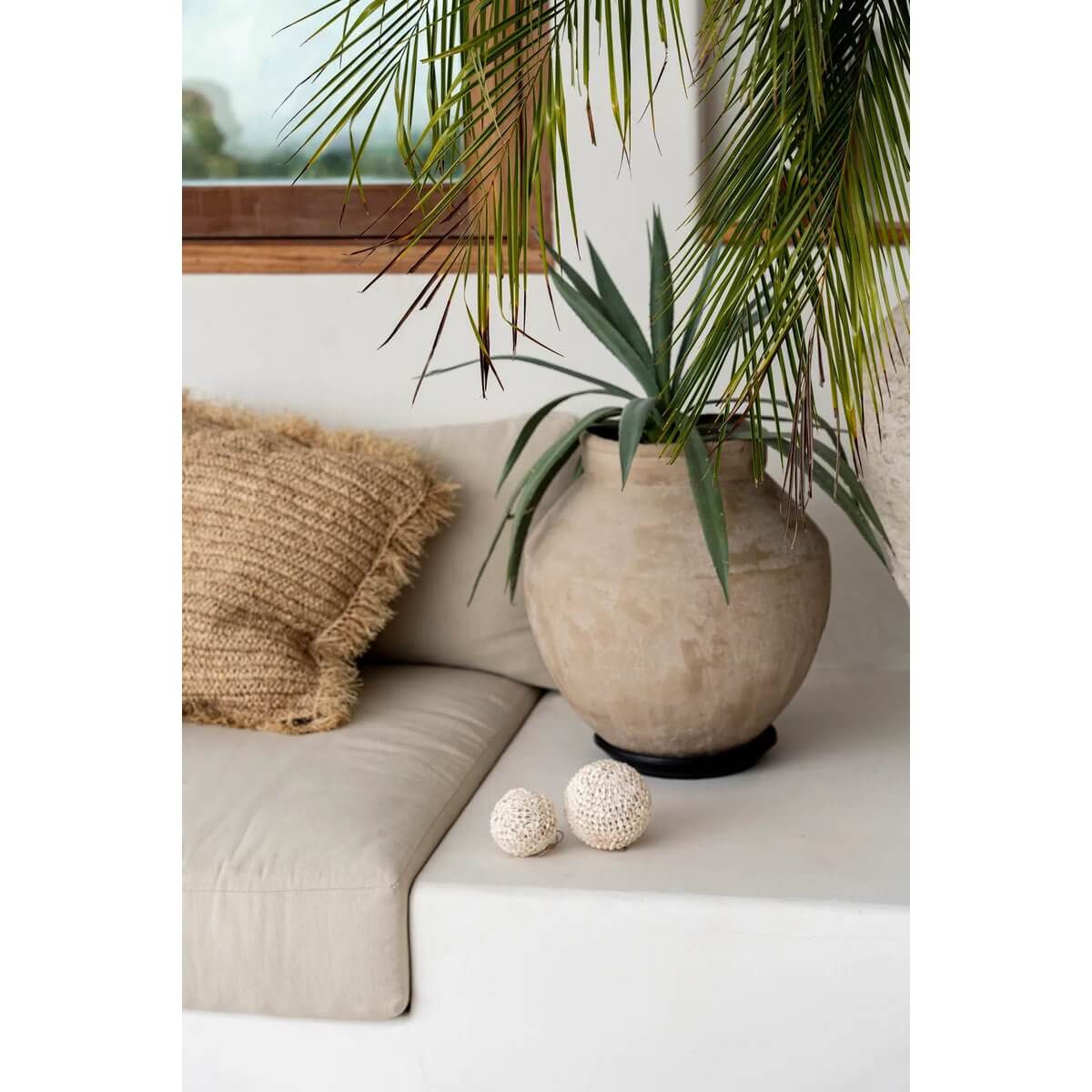 Cozy Bohemian decor with white Bubble Shell Balls and greenery, perfect for a stylish, relaxed interior.