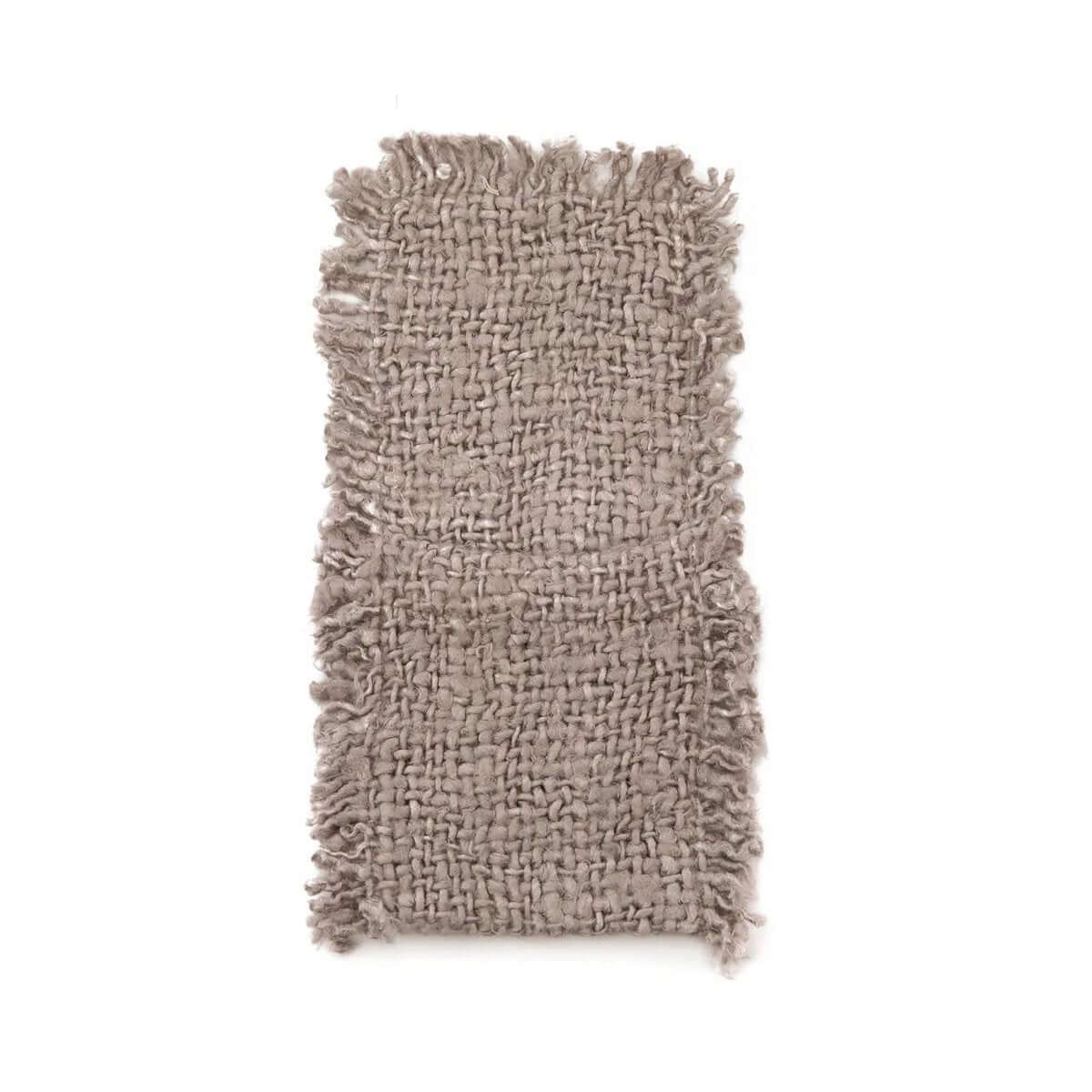 Bohemian style pale grey fabric with textured look, ideal for crafting luxurious home décor or DIY projects. Unique handcrafted elegance.