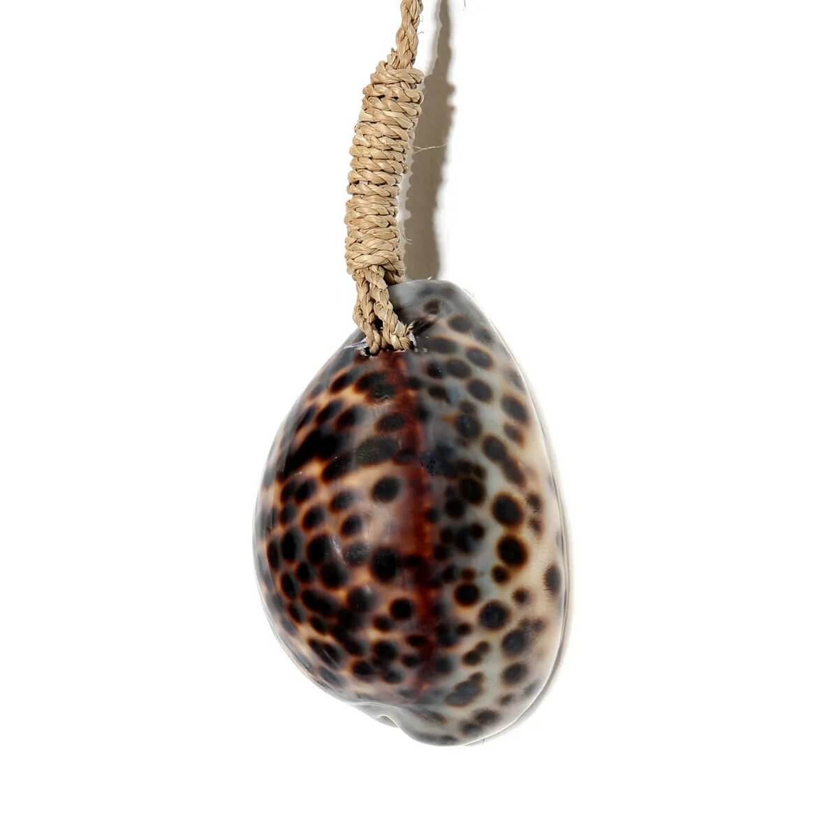 The Tranquility Tassel with exotic tiger shell and rope, perfect for bohemian home decor by Bazar Bizar Living.
