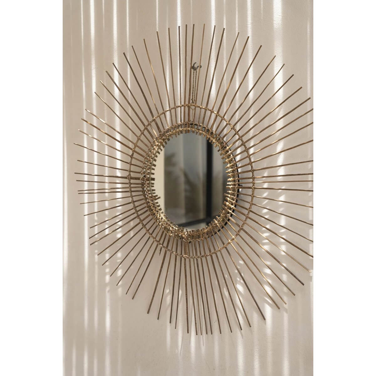 The Tropical Mirror - Naturel L in bohemian rattan design, adding rustic elegance and island flair to any room.